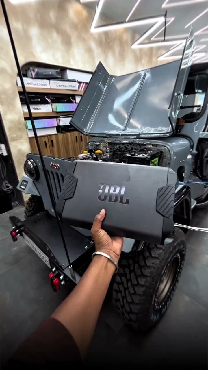 JBL amplifier and speakers, fitted into a Jeep.
